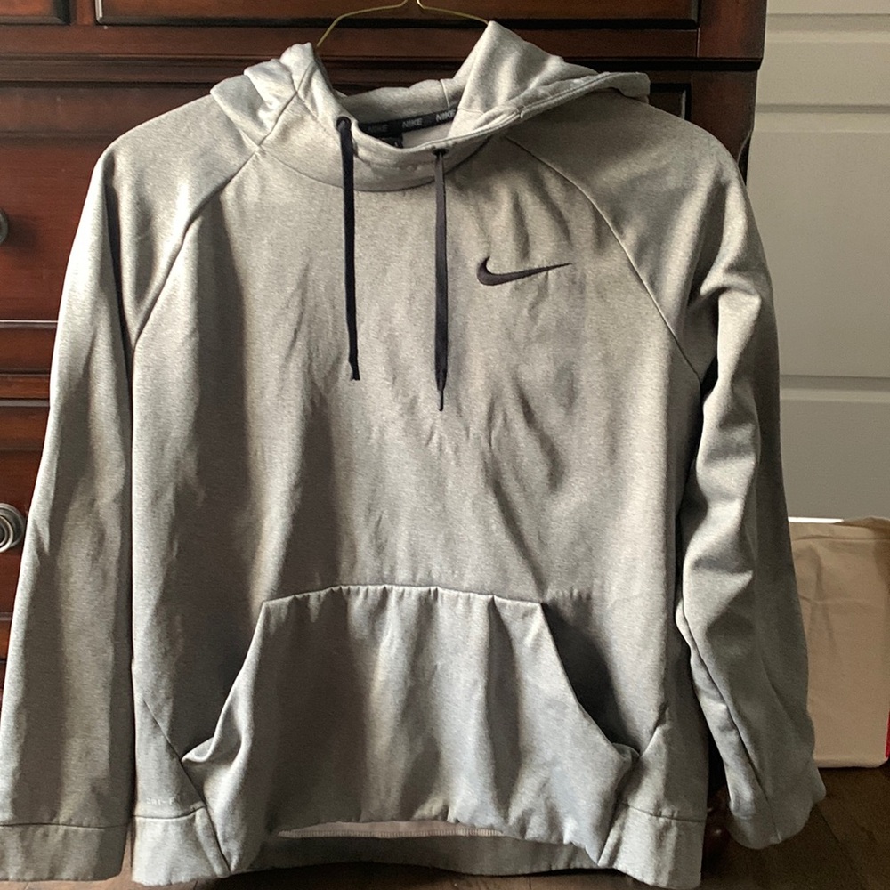 Women’s size large Nike sweater!  Silver/gray color.
